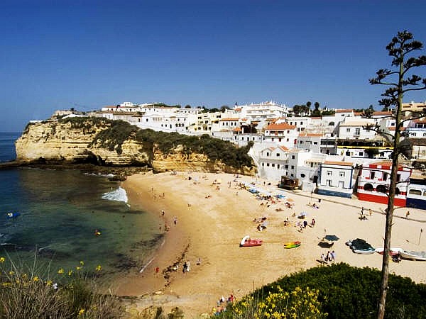 Carvoeiro, Algarve with a view over the beach on a sunny day.
